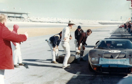 Carroll Smith directing Dan Gurney away from a pit stop during 1966, Daytona.